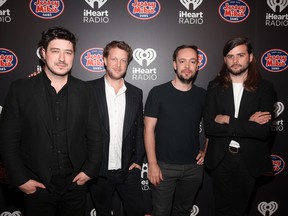 Marcus Mumford, Ted Dwane, Ben Lovett, and Winston Marshall of Mumford & Sons attend iHeartRadio ALTer Ego 2018 at The Forum on January 19, 2018 in Inglewood, United States. (Photo by Jesse Grant/Getty Images for iHeartRadio)