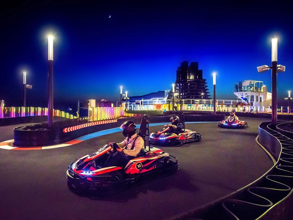 Massive Norwegian Bliss cruise ship featuring twolevel gokart track docks in Halifax on maiden