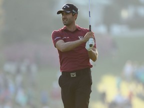 Adam Hadwin of Canada plays a shot during a practice round prior to the start of the Masters at Augusta National Golf Club on April 3, 2018