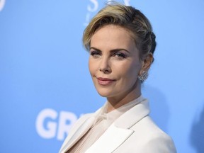 Charlize Theron arrives at the Los Angeles premiere of "Gringo" at Regal L.A. Live on Tuesday, March 6, 2018. Hollywood actress Charlize Theron's tasty endorsement is giving a Hamilton hot sauce some extra zing in their sales. After the "Mad Max: Fury Road" star chomped into a chicken wing covered in Dawson's Hot Sauce, creator Brodie Dawson says bottles of the company's Original Hot flavour experienced a spike in demand.
