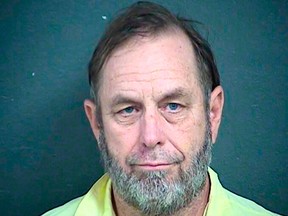 This April 4, 2018 file booking photo provided by the Wyandotte County Detention Center, shows Jeff Henry, co-owner of the Schlitterbahn water park, who is charged in a 10-year-old boy's decapitation death on a 17-storey waterslide that was promoted as the world's largest. Henry pleaded not guilty Thursday, April 5, 2018, to second-degree murder in the in the 2016 death of Caleb Schwab on the massive waterslide. (Wyandotte County Detention Center via AP, File)