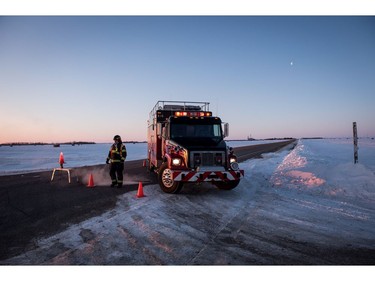 Emergency crews continue to block the highway near where a bus carrying the Humboldt Broncos was struck by a semi north of Tisdale, Sask., Saturday, April 7, 2018.