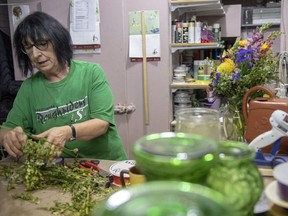 Ruth Brinkman, a florist at Humboldt Florist, puts together bouquets at the store on Main Street in Humboldt, Sask., on Monday, April 9, 2018.