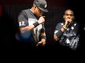 In this Nov. 23, 2011 file photo, Jay-Z and Kanye West performs at the Air Canada Centre in Toronto. (Stan Behal/Postmedia Network)