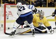 Winnipeg Jets left wing Brandon Tanev (13) scores a goal against Nashville Predators goalie Pekka Rinne (35), during the first period in Game 1 of an NHL hockey second-round playoff series Friday(AP Photo/Mark Humphrey).