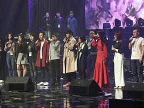 South Korean groups perform during a rehearsal in Pyongyang, North Korea, Sunday, April 1, 2018. South Korean media say North Korean leader Kim Jong Un has watched a rare performance by South Korean pop stars visiting Pyongyang. (Korea Pool via AP)