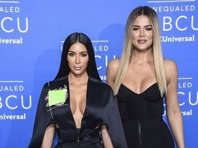 In this May 15, 2017, file photo, television personalities Kim Kardashian West, left, and Khloe Kardashian attend the NBCUniversal Network 2017 Upfront at Radio City Music Hall in New York.