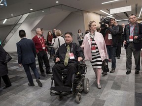 Kent Hehr, MP for Calgary Centre, arrives with his wife Deanna Holt before attending a workshop titled "Ensuring Safe Spaces and Ending Harassment" during the federal Liberal national convention in Halifax on Saturday, April 21, 2018.