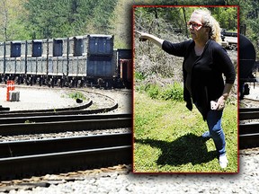 In this April 12, 2018 photo, Mayor Heather Hall discusses the nearby train that was loaded with tons of sewage sludge that is stinking up her community of Parrish, Ala. (AP)