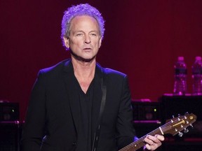 In this Oct. 6, 2014 file photo, Lindsey Buckingham from the band Fleetwood Mac performs at Madison Square Garden in New York.