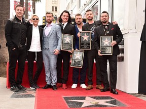 Carson Daly, Ellen Degeneres, Lance Bass, J.C. Chasez, Joey Fatone, Justin Timberlake and Chris Kirkpatrick at a ceremony honouring 'NSYNC with a star on the Hollywood Walk of Fame on April 30, 2018 in Hollywood, Calif.  (Alberto E. Rodriguez/Getty Images)