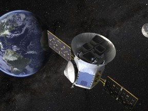 This image made available by NASA shows an illustration of the Transiting Exoplanet Survey Satellite (TESS). (NASA via AP)
