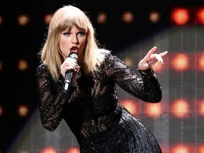 FILE - In this Feb. 4, 2017 file photo, Taylor Swift performs at DIRECTV NOW Super Saturday Night Concert in Houston, Texas. A man arrested outside a Beverly Hills home owned by Swift was wearing a mask and rubber gloves, had a knife, rope and ammunition and told police he had driven there from his Colorado home to see the singer. The 28-year-old Swift, who lives in New York, was not at the home either time.