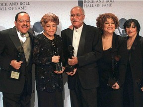 This March 15, 1999 file photo shows the sibling group The Staples Singers, from left, Pervis, Cleotha, Pops, Mavis, and Yvonne at the Rock and Roll Hall of Fame induction ceremony in New York. Yvonne Staples, whose voice and business acumen powered the success of her family's Staples Singers gospel group, has died at age 80.