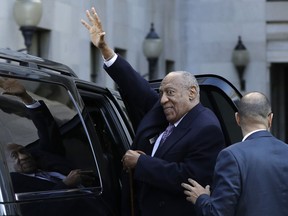 Bill Cosby waves as he departs after his sexual assault trial, Wednesday, April 18, 2018, at the Montgomery County Courthouse in Norristown.