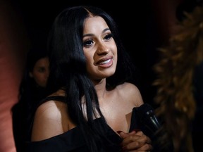 In this Jan. 25, 2018, file photo, Rapper Cardi B attends the Warner Music Group pre-Grammy party at The Grill/The Pool in New York.