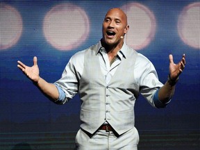 This March 28, 2017, file photo, Dwayne Johnson, a cast member in the upcoming film "Baywatch," addresses the audience during the Paramount Pictures presentation at CinemaCon 2017 in Las Vegas.