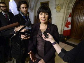Minister of Health Ginette Petitpas Taylor speaks to reporters following Question Period in the House of Commons on Parliament Hill in Ottawa on Wednesday, April 18, 2018.