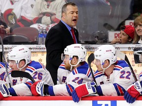 New York Rangers coach Alain Vigneault instructs the bench during a playoff game. (Wayne Cuddington/Postmedia)