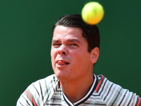 Milos Raonic eyes a ball during a match against Lucas Catarina at the Monte-Carlo ATP Masters Series Tournament on April 16, 2018