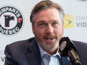 Hall of Fame goaltender Patrick Roy smiles as he announces his comeback with the Quebec Remparts of the QJMHL, Thursday, April 26, 2018 at the Videotron centre in Quebec City