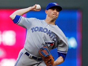 Toronto Blue Jays' pitcher Aaron Sanchez throws against the Minnesota Twins in the first inning of a baseball game Monday, April 30, 2018, in Minneapolis. (AP Photo/Jim Mone)
