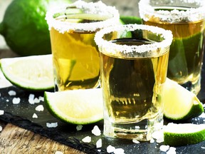 Gold Mexican tequila with lime and salt