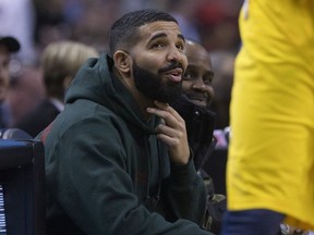 Drake at court side in the first half, as the Toronto Raptors take on the Indiana Pacers at the Air Canada Centre  in Toronto, Ont. on Friday April 6, 2018.