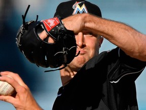 Miami Marlins starting pitcher Trevor Richards throws to the plate during the second inning of a baseball game against the Los Angeles Dodgers on April 25, 2018