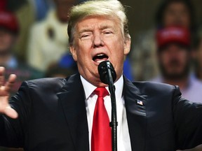 President Donald Trump speaks at a campaign-style rally at the Pensacola Bay Center, in Pensacola, Fla. (CP)