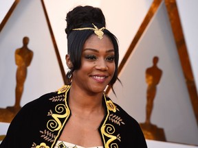 FILE - In this March 4, 2018, file photo, Tiffany Haddish arrives at the Oscars at the Dolby Theatre in Los Angeles. TBS' new comedy "The Last O.G." stars Tracy Morgan a Tray, just out of prison and learning his way around a changed world. The show also serves up a lesson in comedy chemistry. Morgan has it with "Girls Trip" star Haddish, who plays the ex-girlfriend who's built a successful new life during his 15 years away. "The Last O.G." debuts 10:30 p.m. EDT Tuesday, April 3.
