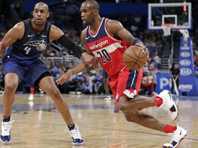 Washington Wizards' Jodie Meeks (20) drives around Orlando Magic's Arron Afflalo (4) Wednesday, April 11, 2018, in Orlando, Fla.