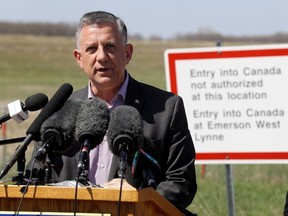 Conservative MP Ted Falk speaks during a press conference to discuss the increase of illegal border crossings near Emerson, Man., on Friday, May 5, 2017.