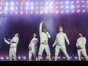 FILE - In this  July 9, 2017, file photo, Brian Littrell, from left, Kevin Richardson, AJ McLean, Nick Carter and Howie Dorough of the Backstreet Boys perform during the Festival d'ete de Quebec in Quebec City, Canada. The Backstreet Boys have a new single. They released "Don't Go Break My Heart" on Thursday, May 17, 2018, along with a video.