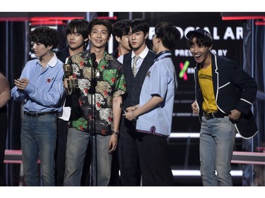 BTS accepts the award for top social artist at the Billboard Music Awards at the MGM Grand Garden Arena on Sunday, May 20, 2018, in Las Vegas.
