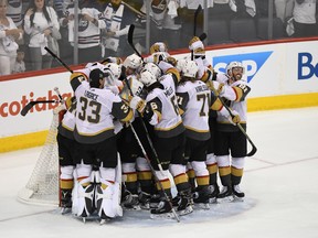 The Vegas Golden Knights celebrate defeating the Winnipeg Jets 2-1 in Game 5 of the Western Conference final to advance to the Stanley Cup final on Sunday. (GETTY IMAGES)