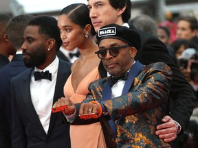 Director Spike Lee, from right, actors Adam Driver, Laura Harrier and John David Washington pose for photographers upon arrival at the premiere of the film 'BlacKkKlansman' at the 71st international film festival, Cannes, southern France, Monday, May 14, 2018. (Photo by Joel C Ryan/Invision/AP)