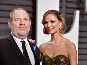 Harvey Weinstein (L) and fashion designer Georgina Chapman attend the 2017 Vanity Fair Oscar Party hosted by Graydon Carter at Wallis Annenberg Center for the Performing Arts on February 26, 2017 in Beverly Hills, California.