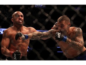 DALLAS, TX - MAY 13: (L-R) Eddie Alvarez fights against Dustin Poirier in their Lightweight bout during UFC 211 at American Airlines Center on May 13, 2017 in Dallas, Texas.