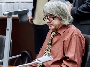 David Turpin, accused of shackling and starving some of his 13 children, appears in court before his hearing at the Riverside Hall of Justice in Riverside, Calif. on Friday, May. 18, 2018. Turpin pleaded not guilty Friday to lying on government forms about their schooling. Turpin and his wife Luoise previously pleaded not guilty to torture, abuse and other charges. They are each being held on $12 million bail. (Watchara Phomicinda/The Press-Enterprise via AP, Pool)