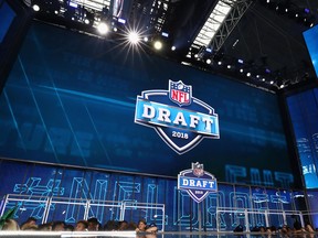 The 2018 NFL Draft logo is seen on a video board during the first round of the 2018 NFL Draft at AT&T Stadium on April 26, 2018 in Arlington, Texas. (Ronald Martinez/Getty Images)
