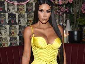 Founder and CEO, KKW Kim Kardashian attends an intimate dinner hosted by The Business of Fashion to celebrate its latest special print edition 'The Age of Influence' at Peachy's/Chinese Tuxedo on May 8, 2018 in New York City.