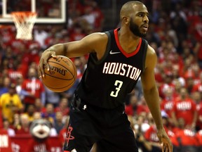 Chris Paul of the Houston Rockets handles the ball in the first half against the Golden State Warriors in Game One of the Western Conference Finals of the 2018 NBA Playoffs at Toyota Center on May 14, 2018 in Houston, Texas. (Ronald Martinez/Getty Images)