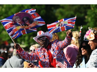 WINDSOR, ENGLAND - MAY 19:  Royal fans soak up the atmopshere during the wedding of Prince Harry Harry to Ms. Meghan Markle on The Long Walk on May 19, 2018 in Windsor, England.