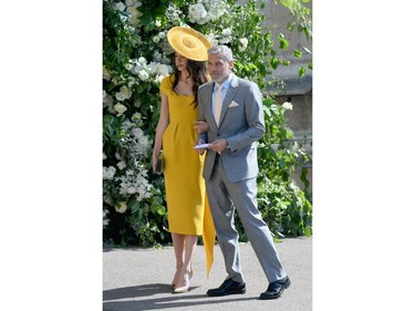 WINDSOR, ENGLAND - MAY 19:  George and Amal Clooney attend the wedding of Prince Harry to Ms Meghan Markle at St George's Chapel, Windsor Castle on May 19, 2018 in Windsor, England. Prince Henry Charles Albert David of Wales marries Ms. Meghan Markle in a service at St George's Chapel inside the grounds of Windsor Castle. Among the guests were 2200 members of the public, the royal family and Ms. Markle's Mother Doria Ragland.