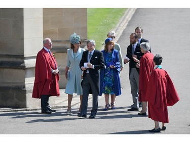 WINDSOR, ENGLAND - MAY 19:  Carole Middleton, Michael Middleton, guest,  James Middleton, Pippa Middleton and James Matthews (rear) attnd the wedding of Prince Harry to Ms Meghan Markle at St George's Chapel, Windsor Castle on May 19, 2018 in Windsor, England. Prince Henry Charles Albert David of Wales marries Ms. Meghan Markle in a service at St George's Chapel inside the grounds of Windsor Castle. Among the guests were 2200 members of the public, the royal family and Ms. Markle's Mother Doria Ragland.