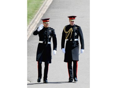 WINDSOR, ENGLAND - MAY 19:  Prince Harry and Prince William, Duke of Cambridge the wedding of Prince Harry to Ms Meghan Markle at St George's Chapel, Windsor Castle on May 19, 2018 in Windsor, England. Prince Henry Charles Albert David of Wales marries Ms. Meghan Markle in a service at St George's Chapel inside the grounds of Windsor Castle. Among the guests were 2200 members of the public, the royal family and Ms. Markle's Mother Doria Ragland.