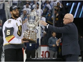 Deryk Engelland of the Vegas Golden Knights is presented with the Clarence S. Campbell Bowl after defeating the Winnipeg Jets 2-1 in Game Five of the Western Conference Finals to advance to the 2018 NHL Stanley Cup Final at Bell MTS Place on May 20, 2018 in Winnipeg.