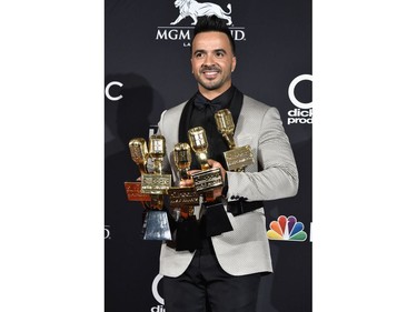 Recording artist Luis Fonsi poses in the press room during the 2018 Billboard Music Awards at MGM Grand Garden Arena on May 20, 2018 in Las Vegas, Nevada.
