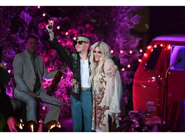 Macklemore (L) and Kesha perform during the 2018 Billboard Music Awards at Toshiba Plaza on May 19, 2018 in Las Vegas, Nevada.